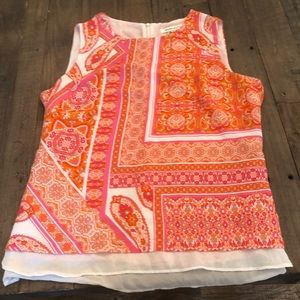 Silky sleeveless blouse. Size L never worn